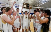 Jack Malandro (3) and Van Miller (40) of Southern celebrate with the trophy after winning the Shore Conference Tournament boys volleyball final between Southern and Marlboro at Georgian Court University in Lakewood, NJ on 5/22/25.