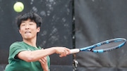 Andrew Cui of East Brunswick hits a return in first singles during the tennis match between South Brunswick and East Brunswick at South Brunswick High School in South Brunswick, NJ on 4/15/25.