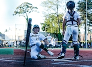 Lana Rudolph (33) of Red Bank Catholic avoids a bat as she scores a run during the Shore Conference Tournament softball final between Red Bank Catholic and Colts Neck at Count Basie Park in Red Bank, NJ on 5/19/25.