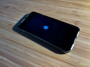 This image shows the Apple logo as an iPhone turns on. (Advance/SILive.com | Mike Matteo)