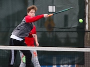 Daniel Calianese of Bergen Catholic returns a shot against Vihan Achavya and Maximo Chui of Summit during the second doubles match of the boys tennis match at Memorial Park in Summit, NJ on Wednesday, April 2, 2025.