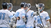 Cale Stielau (11) and Tyler Rotkowitz (9) of Shawnee celebrate a goal scored during a boys lacrosse game against Moorestown at Moorestown High School, Thursday, April 10, 2025