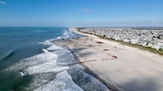 United States Army Corps of Engineers workers replenish the beach in Avalon in May 2023 as part of ongoing federally-subsidized projects.