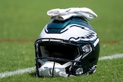 Philadelphia Eagles helmet sits on the field during the practice at NFL football minicamp, Tuesday, June 4, 2024, in Philadelphia. (AP Photo/Chris Szagola)