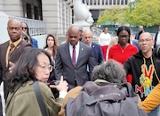 Mayor Ras Baraka addresses a crowd in front of the Federal Court building in Newark. Federal Court following a hearing for trespassing charges at the Delaney Hall immigrant detention center in Newark. The mayor appeared at court court, six days after being arrested following an altercation with homeland security officers outside a detention center in the city. Newark, N.J. May 15, 2025