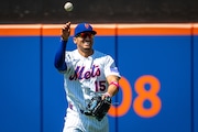 New York Mets outfielder Tyrone Taylor smiles during Monday's game against the Chicago White Sox. (AP Photo/Angelina Katsanis)