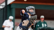 Anthony Palombit (15) of Roxbury throws to first base on a ball in the dirt to complete a strikeout during the Opening Day baseball game between No. 1 Delbarton and Roxbury at The Delbarton School in Morristown, NJ on 4/1/24.