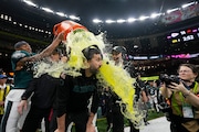 Philadelphia Eagles head coach Nick Sirianni is dunked by teammates during the second half the NFL Super Bowl 59 football game against the Kansas City Chiefs, Sunday, Feb. 9, 2025, in New Orleans. (AP Photo/Matt Slocum)