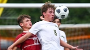North Hunterdon's Mack Metcalf (8) blocks Voorhees' Dillon Devine (22) as he battles to control the ball on Sept. 7, 2023.	 