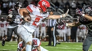 Hunterdon Central’s Jacob Saus (2) looks to get the ball past Phillipsburg's Patrick Day (13) as Phillipsburg football hosts Hunterdon Central on Sept. 29, 2023