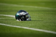 A Philadelphia Eagles' helmet is seen before an NFL football game, Sunday, Dec. 8, 2024, in Philadelphia.