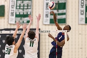 Timothy Smith of West Caldwell Tech (1) shoots over Ethan Yang (20) and Ethan Levine (11) of Livingston in Tuesday's high school boys volleyball action in Livingston.  The Eagles bit the Lancers in three, 25-20, 25-25, 26-24.  04/01/2025