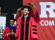 Ramy Youssef is hooded during the 2025 Rutgers University-Newark's Commencement in Newark, NJ on Thursday, May 22, 2025